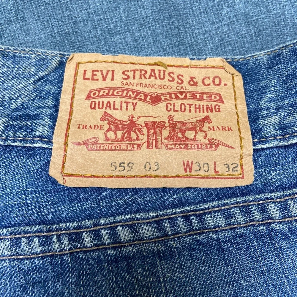 Vintage Levi's 569 Jeans Women 03 30x32 Blue Denim Medium Wash Flare Leg Raw Hem